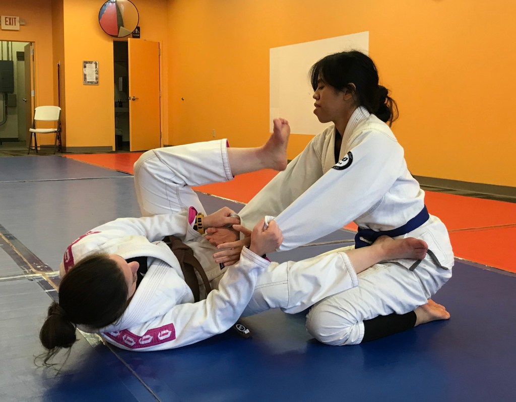 Jen then wraps Liz's right arm